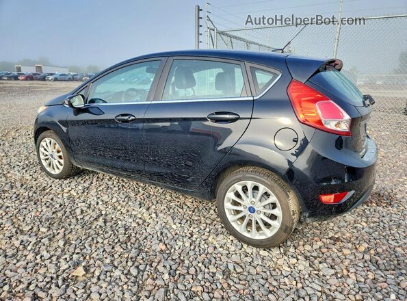3FADP4FJ1HM123938 2017 FORD FIESTA Black Rear left