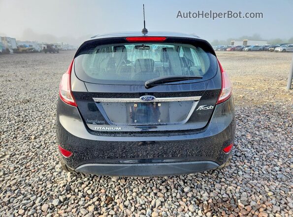 3FADP4FJ1HM123938 2017 FORD FIESTA Black Rear view