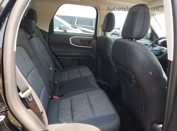 3FMCR9B67PRD67606 2023 FORD BRONCO Черный Вид задней части салона