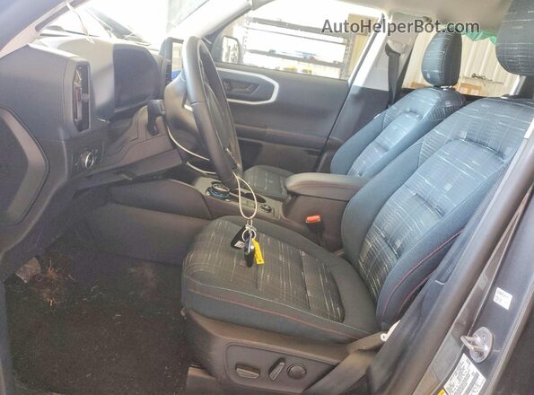 3FMCR9G63RRF09283 2024 FORD BRONCO Серый Вид салона спереди