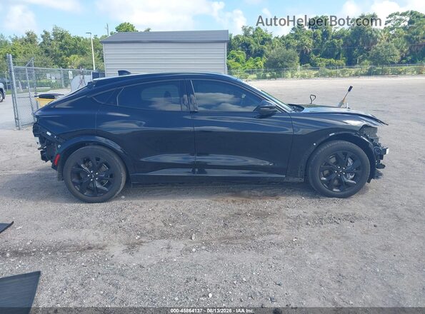 3FMTK3R74PMA89101 2023 FORD MUSTANG MACH-E Black Սալոնի հետևի տեսք