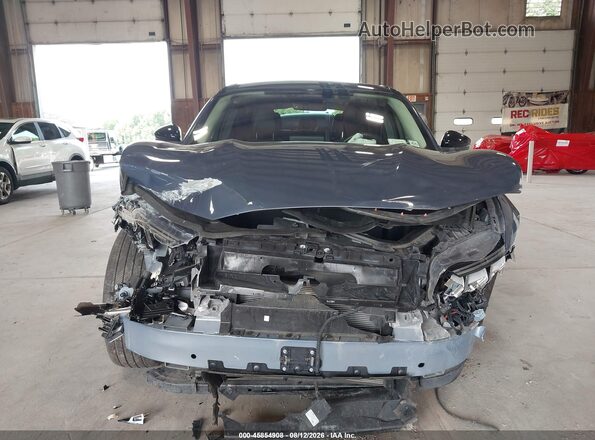 3FMTK3RM7MMA24325 2021 FORD MUSTANG MACH-E Light Blue Widok wnętrza z tyłu