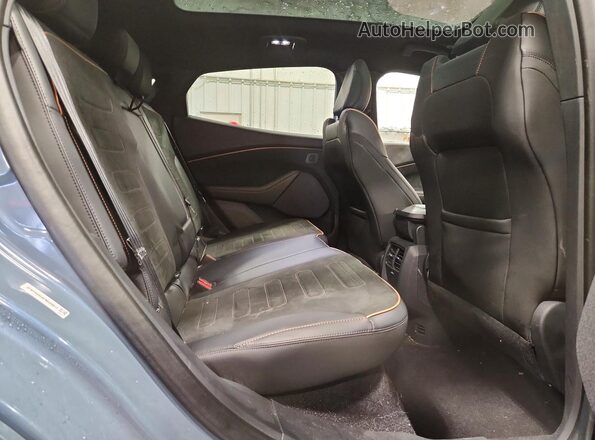 3FMTK4SE8PMA39011 2023 FORD MUSTANG Teal Vista interior trasera