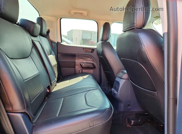 3FTTW8A34SRA78769 2025 FORD MAVERICK White Vista de los asientos traseros