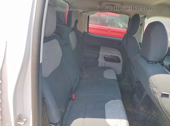 3FTTW8H38SRA29905 2025 FORD MAVERICK White Vista de los asientos traseros