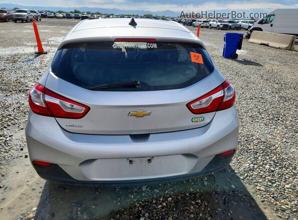 3G1BC6SM7KS614812 2019 CHEVROLET CRUZE Серебряный Вид сзади