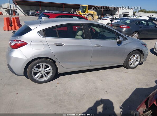 3G1BE6SM3HS559570 2017 CHEVROLET CRUZE Silver Widok wnętrza z tyłu