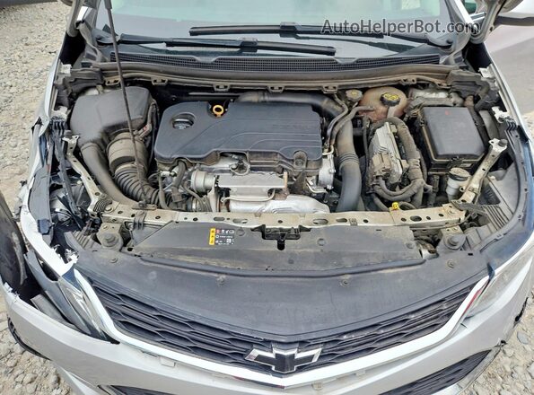 3G1BE6SMXJS606695 2018 CHEVROLET CRUZE Silver Սալոնի հետևի տեսք