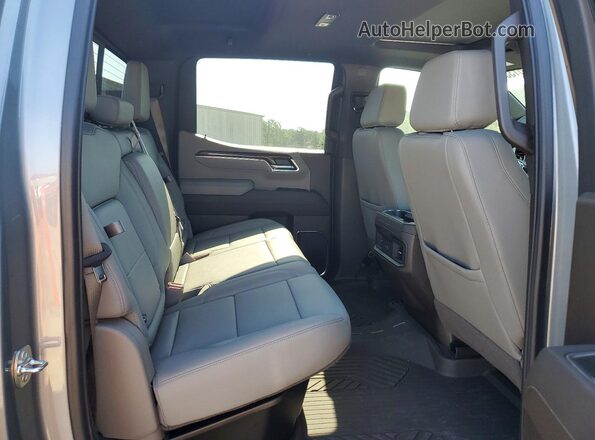 3GCUKFEL7TG372971 2026 CHEVROLET SILVERADO Silver Rear seats view