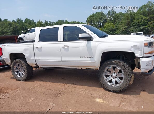 3GCUKREC1HG289433 2017 CHEVROLET SILVERADO White Widok wnętrza z tyłu