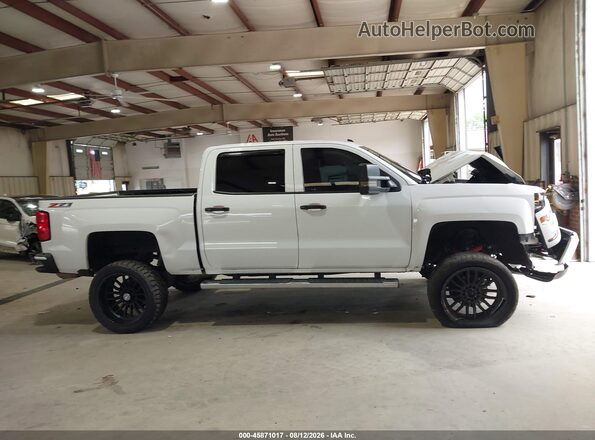 3GCUKREC4HG218811 2017 CHEVROLET SILVERADO White Rear interior view