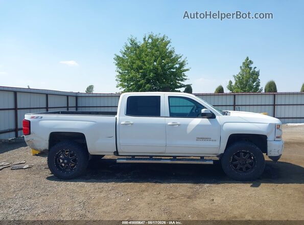 3GCUKREC4HG501192 2017 CHEVROLET SILVERADO White Սալոնի հետևի տեսք