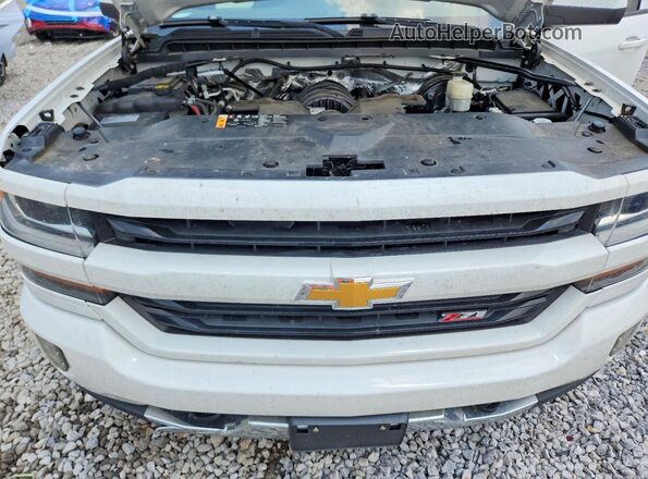 3GCUKREC8HG383857 2017 CHEVROLET SILVERADO White Widok wnętrza z tyłu