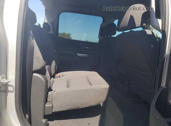 3GCUKREC8JG497329 2018 CHEVROLET SILVERADO Silver Vista de los asientos traseros