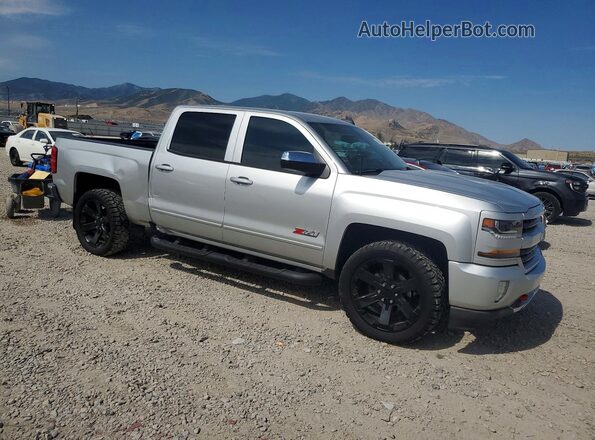 3GCUKREH5HG402151 2017 CHEVROLET SILVERADO Серебряный Передняя правая четверть
