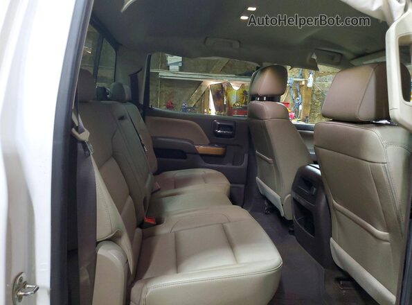 3GCUKSEC6JG360204 2018 CHEVROLET SILVERADO White Vista de los asientos traseros
