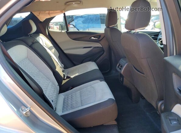 3GNAXHEG9PL254301 2023 CHEVROLET EQUINOX Silver Widok wnętrza z tyłu