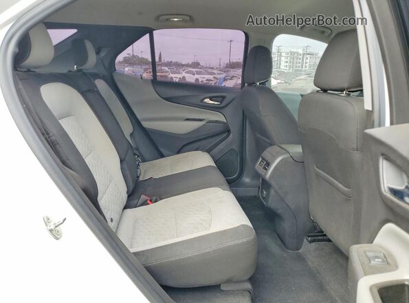 3GNAXHEV6JS563042 2018 CHEVROLET EQUINOX Белый Вид задней части салона