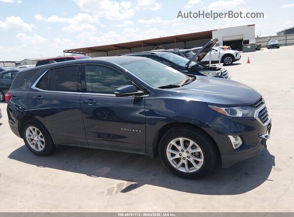 3GNAXJEV1JS580595 2018 CHEVROLET EQUINOX Blue Widok wnętrza z tyłu