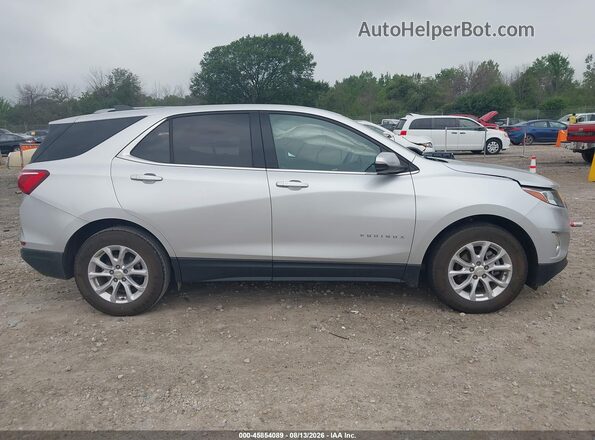 3GNAXJEV1KS647357 2019 CHEVROLET EQUINOX Silver Widok wnętrza z tyłu