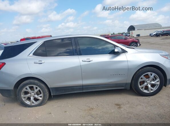 3GNAXKEX1JS517651 2018 CHEVROLET EQUINOX Silver Widok wnętrza z tyłu