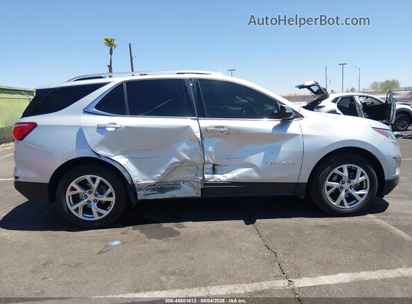 3GNAXMEV3JS623173 2018 CHEVROLET EQUINOX Silver Вид задньої частини салону