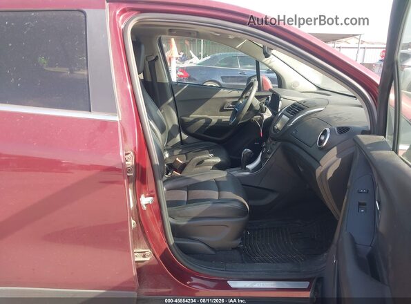3GNCJMSBXGL265352 2016 CHEVROLET TRAX Бордовый Вид салона спереди