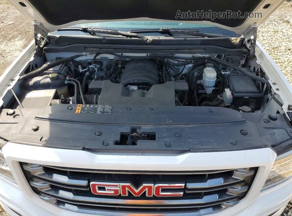 3GTU2NEC0HG436317 2017 GMC SIERRA White Widok wnętrza z tyłu