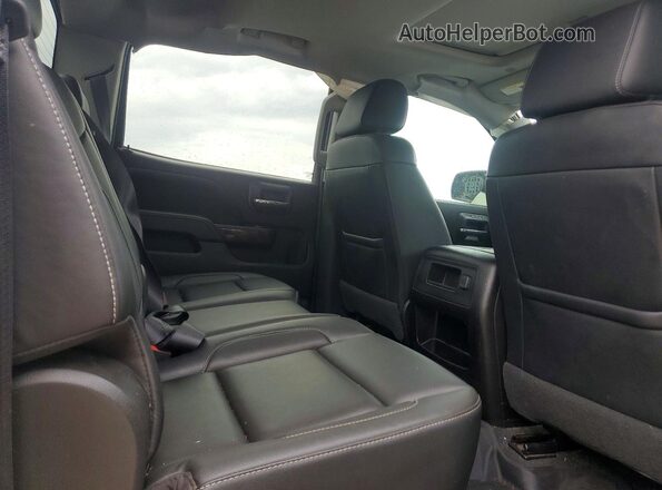 3GTU2NEC3JG631981 2018 GMC SIERRA White Vista de los asientos traseros
