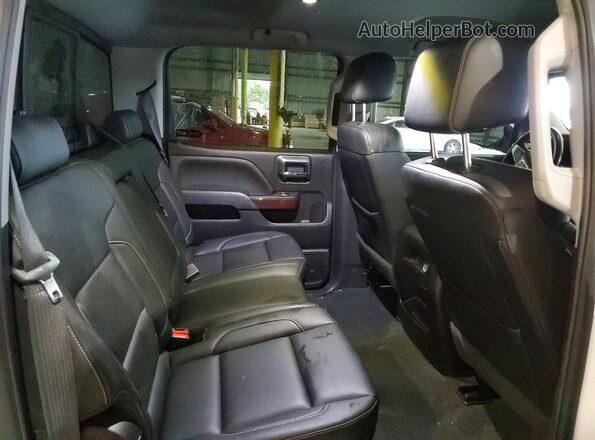 3GTU2NEC8JG633032 2018 GMC SIERRA White Vista de los asientos traseros