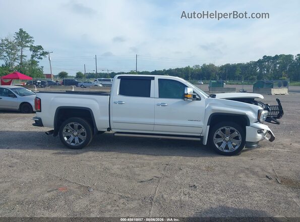 3GTU2PEC5GG309458 2016 GMC SIERRA White Rear interior view