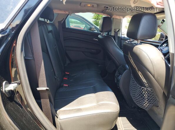 3GYFNBE33GS547013 2016 CADILLAC SRX Black Вид задньої частини салону