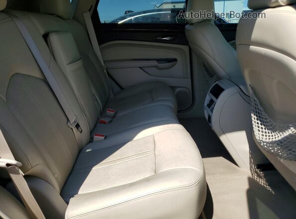 3GYFNBE3XGS527616 2016 CADILLAC SRX Gold Vista interior trasera