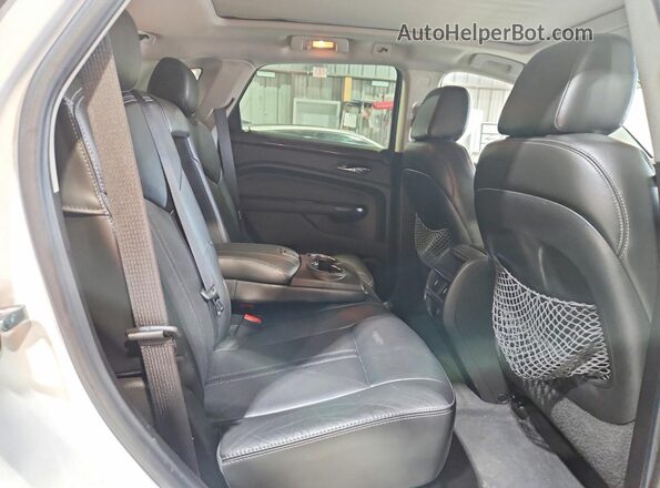 3GYFNCE32GS500772 2016 CADILLAC SRX White Սալոնի հետևի տեսք