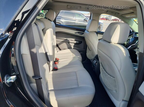 3GYFNCE32GS550166 2016 CADILLAC SRX Black Rear interior view