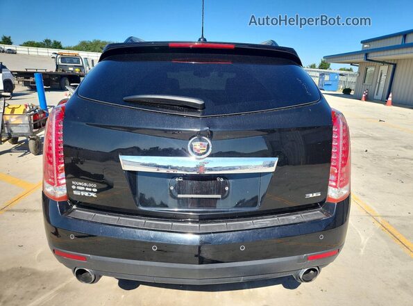 3GYFNCE32GS561393 2016 CADILLAC SRX Black Вид ззаду