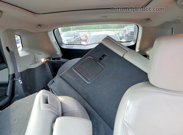 3GYFNEE32GS573569 2016 CADILLAC SRX Silver Հետևի նստատեղերի տեսք