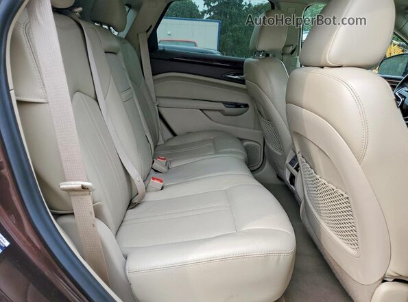 3GYFNEE34GS509582 2016 CADILLAC SRX Brown Սալոնի հետևի տեսք