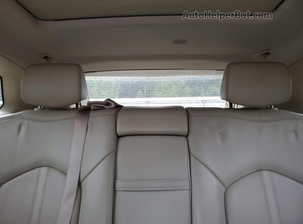 3GYFNEE34GS509582 2016 CADILLAC SRX Brown Հետևի նստատեղերի տեսք