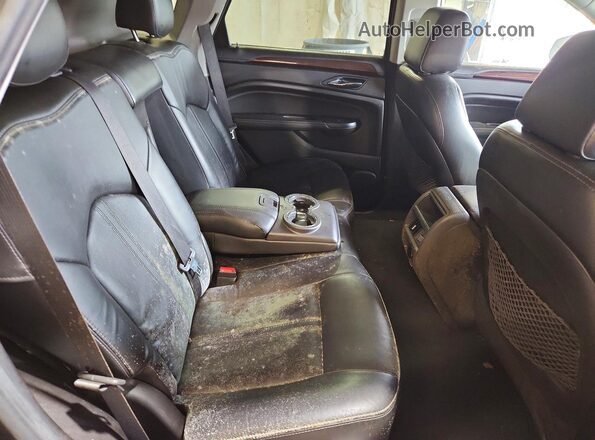 3GYFNEE38GS504675 2016 CADILLAC SRX Black Սալոնի հետևի տեսք