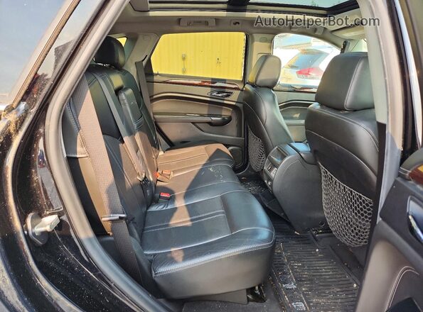 3GYFNEE39GS549608 2016 CADILLAC SRX Черный Вид задней части салона