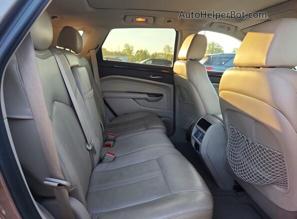 3GYFNEE3XGS585968 2016 CADILLAC SRX Gray Vista interior trasera
