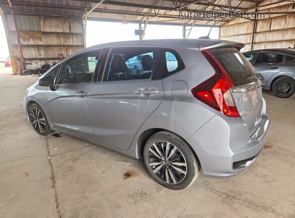3HGGK5G84JM711928 2018 HONDA FIT Silver Rear left