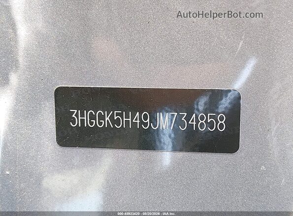 3HGGK5H49JM734858 2018 HONDA FIT Silver Vista del compartimento del motor