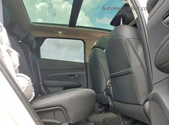 3KMJCCDE0TE034659 2026 HYUNDAI TUCSON White Widok wnętrza z tyłu