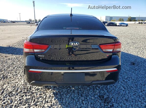 3KPA24AD0ME366383 2021 KIA RIO Black Rear view