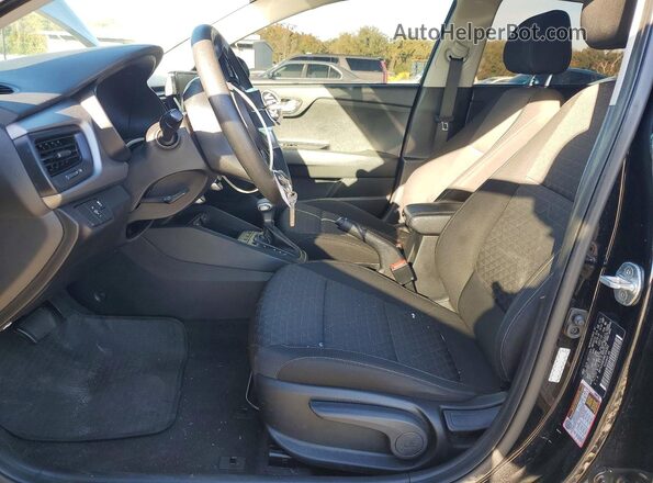 3KPA24AD0ME366383 2021 KIA RIO Black Front interior view