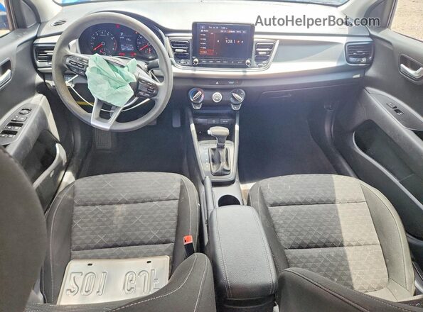 3KPA24AD0PE582092 2023 KIA RIO Синий Вид панели приборов