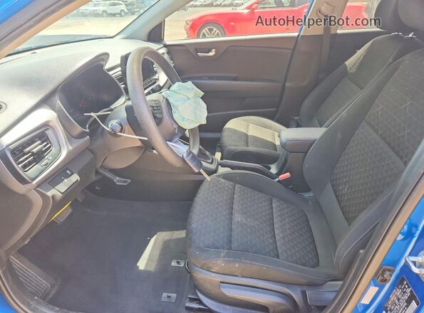 3KPA24AD0PE582092 2023 KIA RIO Синий Вид салона спереди