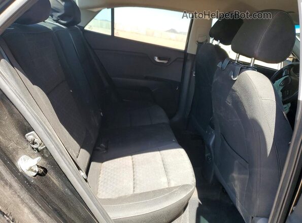 3KPA24AD1LE334427 2020 KIA RIO Black Vista de los asientos traseros